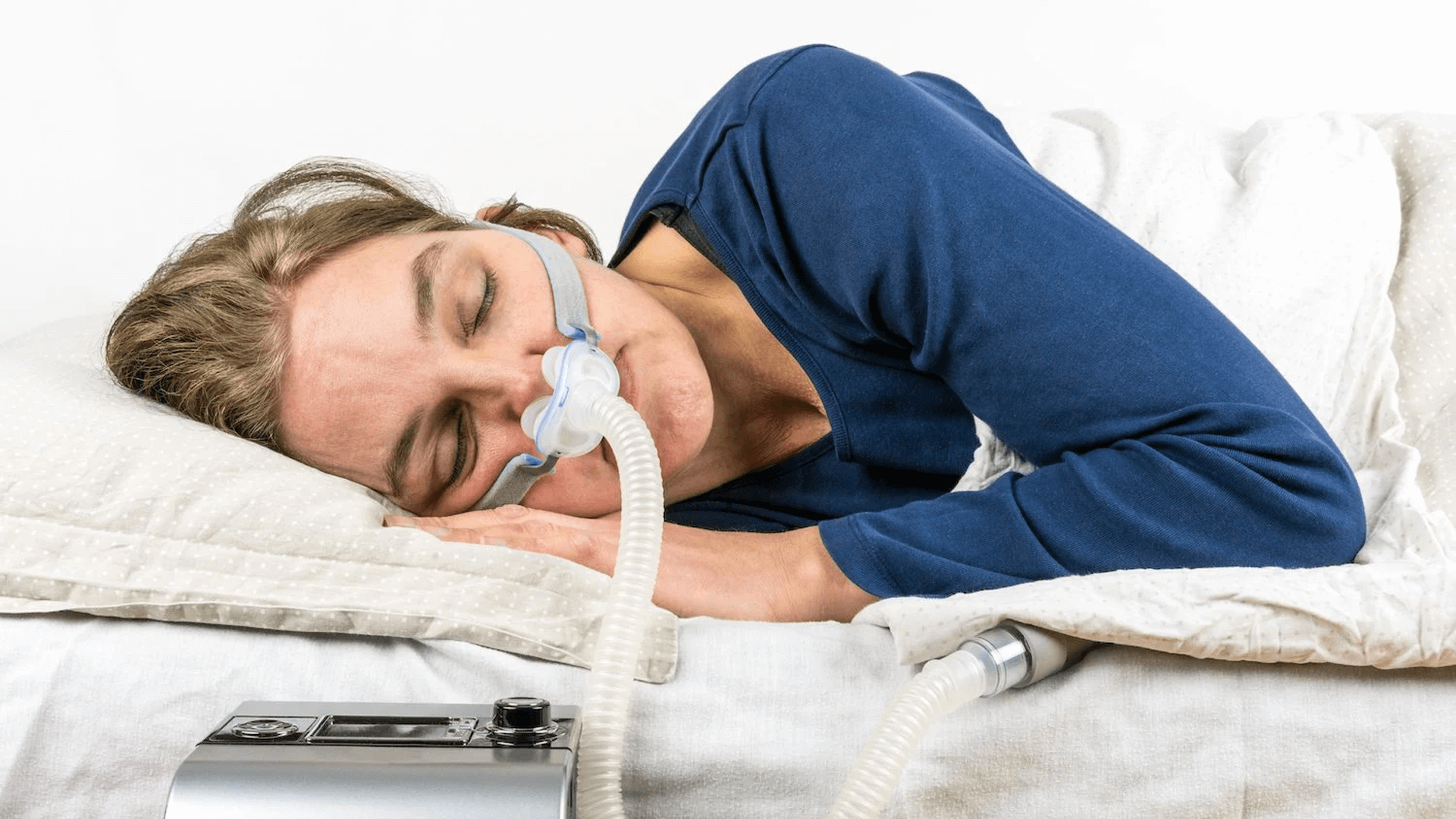 Woman with sleeping equipment .