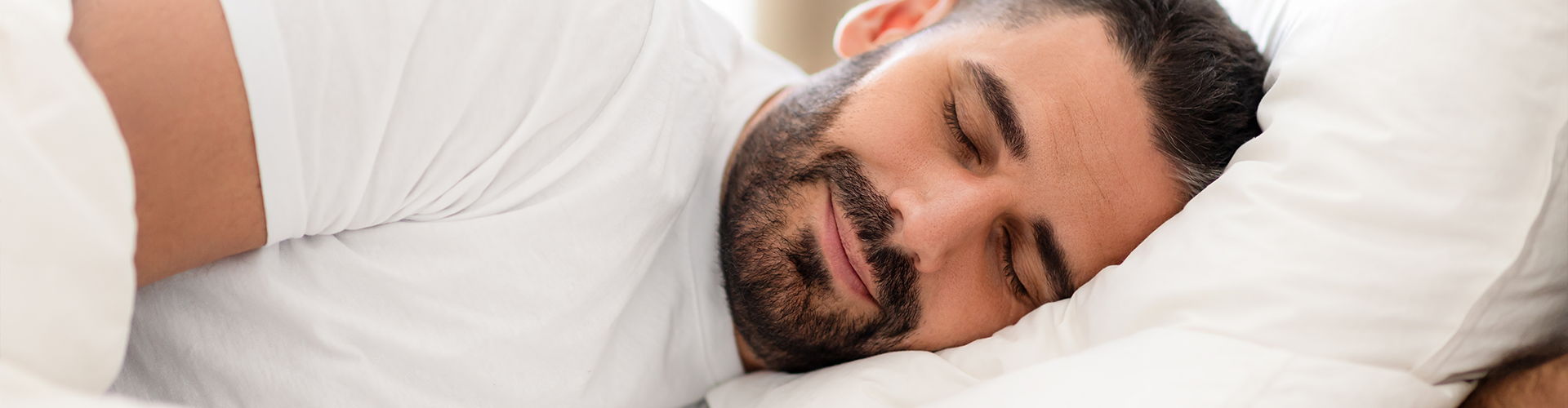 man sleeping on his side.